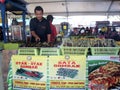 Street vendors and hawkers sell local goods and food to the public on-street by opened a small stall.