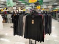 Various types of clothes are being sold in supermarkets. Royalty Free Stock Photo