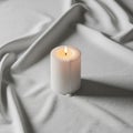 Serene atmosphere enhancing the contrast between the light candle and Royalty Free Stock Photo
