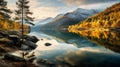 Serene Autumn Sunset: Mountain Peaks Reflecting In A Lake Royalty Free Stock Photo