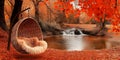 Serene Autumn Waterfall Scene with Cozy Wicker Egg Chair Royalty Free Stock Photo