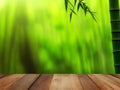 Serene Bamboo Forest with Wooden Floor Royalty Free Stock Photo
