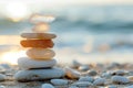 Serene Beach Pebble Stack at Sunset Royalty Free Stock Photo