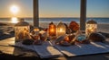 Romantic Seashells and Candles at Sunset on the Beach Royalty Free Stock Photo