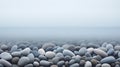 Serene beach with smooth grey pebbles fading into the clear misty water. Calm ocean, quiet seascape. Generative AI Royalty Free Stock Photo