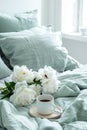 Serene Bedroom Morning With White Peonies on Soft Linens