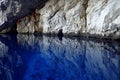 Serene Blue Cave with Reflective Water