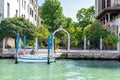 Serene Boat Mooring by an Arch in Venice, Italy Royalty Free Stock Photo
