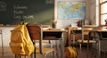Empty Classroom with Yellow Backpack Royalty Free Stock Photo