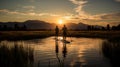 Serene Coastal Views: Two Humans On Paddle Board In Luminous Waterway