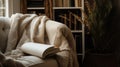 A serene corner of a home with a cozy armchair, a stack of novels, and a soft throw blanket, prepared for a Mother's Royalty Free Stock Photo