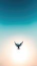 Serene dove in flight against soft gradient sky at sunrise Royalty Free Stock Photo