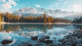 Serene early autumn morning at high tatra lake mountain glow, pine trees, and sky reflections