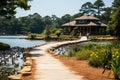 Serene elderly couple walking hand in hand by the tranquil lakeside with picturesque scenery Royalty Free Stock Photo