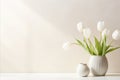 Serene and elegant close up of white tulips on a white table, bathed in soft and gentle light tones