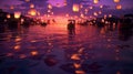 Floating lanterns above a lake with purple sunset sky Royalty Free Stock Photo