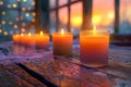 Serene Evening Ambiance with Multiple Glowing Candles on Wooden Table Against Blurry Lights Background Royalty Free Stock Photo