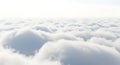 Serene expanse of soft clouds stretching into a tranquil horizon under a pale sky Royalty Free Stock Photo