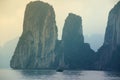 Serene Ha Long Bay: Limestone Karsts and Solitary Boat in Vietnam Royalty Free Stock Photo