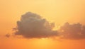 Single White Cloud in Orange Sky Royalty Free Stock Photo