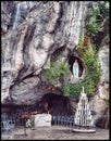 Lourdes Grotto: Candles and Virgin Mary Statue