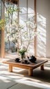 Serene japanese tea room with spring blossoms and sunlit decor Royalty Free Stock Photo