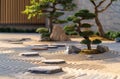 Serene Japanese Zen Garden with Bonsai and Raked Sand Royalty Free Stock Photo