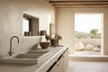 Clean White Desert Kitchen with Natural Light and Boulders Outdoors
