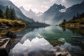 serene lake surrounded by misty mountains and towering peaks Royalty Free Stock Photo