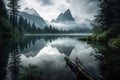 serene lake surrounded by misty mountains and towering peaks Royalty Free Stock Photo