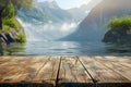 Serene Lake View from Wooden Pier with Majestic Mountains and Lush Greenery in Misty Morning Light for Tranquil Nature Backdrop Royalty Free Stock Photo