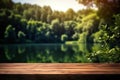 Serene Lakeside Retreat Empty Wooden Table with Summer Forest\'s Lush Green Blur. created with Generative AI Royalty Free Stock Photo