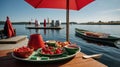 Delicious Summer Fruit Platter on Lakeside Dock Royalty Free Stock Photo