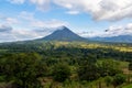 Serene Landscape Amidst Majestic Mountains and Lush Forest