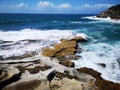Serene landscape featuring rocks, water, and sky. Bondi walk to Coogee, Australia Royalty Free Stock Photo