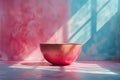 Serene Light Casting Shadows Over Red Bowl Royalty Free Stock Photo