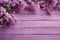 Serene lilac blooms grace a wooden plank background, spring\'s enchantment.