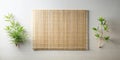 Serene minimalist composition featuring a natural bamboo mat and lush greenery. Generative AI Royalty Free Stock Photo