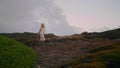 Serene model going nature cloudy sky background. Girl walking sunset hill alone Royalty Free Stock Photo