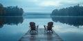 Serene Morning At A Lakeside Cottage With Empty Adirondack Chairs On The Dock, Copy Space Royalty Free Stock Photo