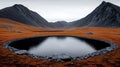 Serene mountain landscape with a round reflective pond and autumn foliage Royalty Free Stock Photo