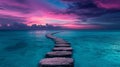 Serene ocean pathway at vibrant sunset with dramatic purple and pink sky Royalty Free Stock Photo
