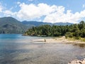 Serene panorama of the calm waters of Panguipulli Lake, from the village of Panguipulli. Patagonian area, Chile