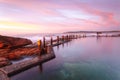 Serene pastel colours of early dawn morning light at Mahon Pool