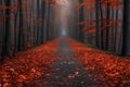 Serene path covered with fallen leaves, flanked by foggy, autumnal trees Royalty Free Stock Photo