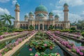 A serene and peaceful Islamic background depicting a tranquil mosque nestled amidst a lush garden