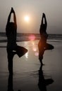 Serene People In The Beach Doing Yoga In The Sunset Concept Royalty Free Stock Photo