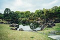 Serene pond with rocks stones in Kyoto Garden