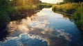 Serene river flows, reflecting sky, in untouched nature's golden hour glow Royalty Free Stock Photo