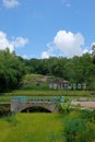 Serene Rural Landscape with Architecture and Lush Greenery PrÃ¨s De Leau. Royalty Free Stock Photo